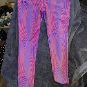 Under Armor leggings with pin stripe print size large